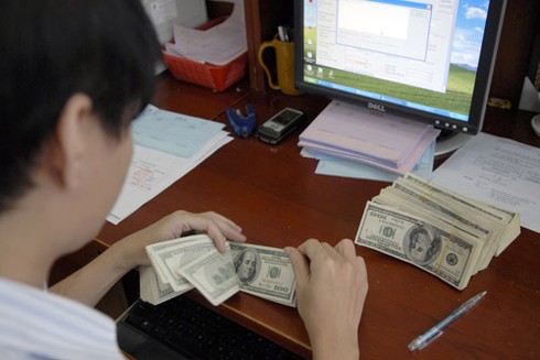 Tăng tỷ giá USD 1%, nợ nước ngoài tăng 10.000 tỷ đồng - ảnh 1