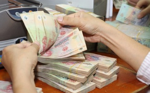 Ngân hàng và thuế bắt tay chống rửa tiền - ảnh 1