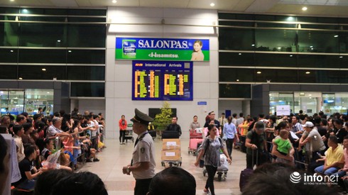 Kiều bào hối hả về quê ăn Tết - ảnh 2