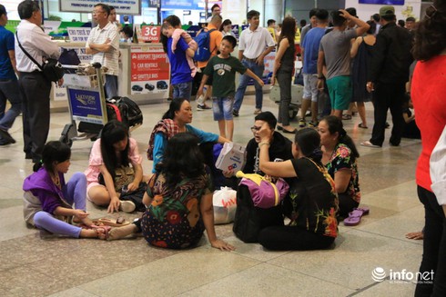 Kiều bào hối hả về quê ăn Tết - ảnh 9