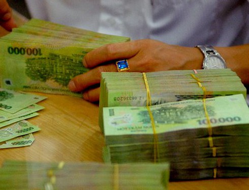 Tăng lương tối thiểu lên 1,15 triệu đồng từ 1/7/2013 - ảnh 1