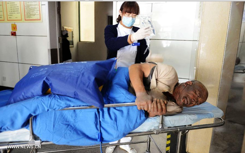 Chùm ảnh vụ nổ đường dẫn dầu kinh hoàng ở Trung Quốc - ảnh 9