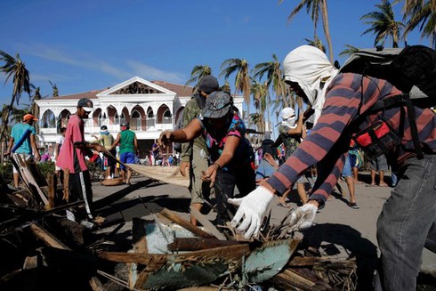 Philippines: Hai tuần sau bão Haiyan, vẫn tìm thấy hàng chục thi thể mỗi ngày - ảnh 1