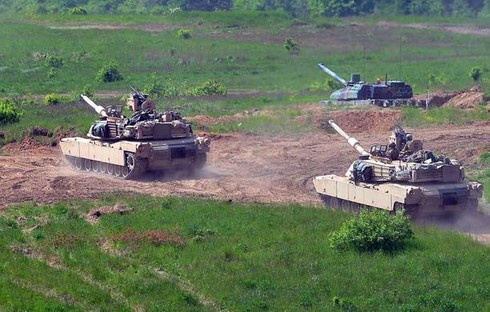 Ba Lan tăng cường vũ trang, tập trận với NATO - ảnh 1