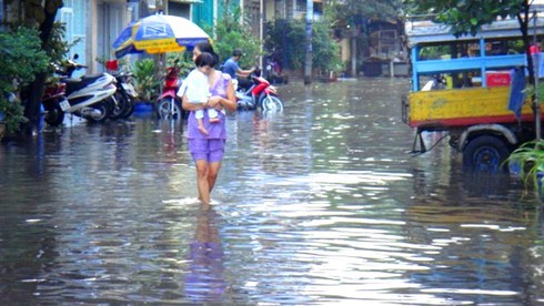 Triều cường kỷ lục biến Sài Gòn thành biển nước - ảnh 18