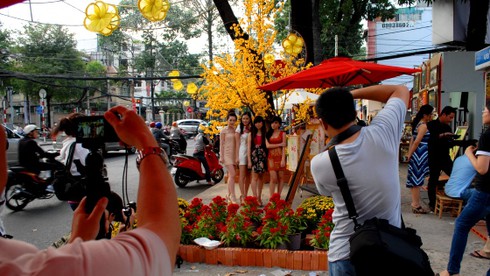 Không khí Tết đã tràn ngập Sài Gòn - ảnh 18