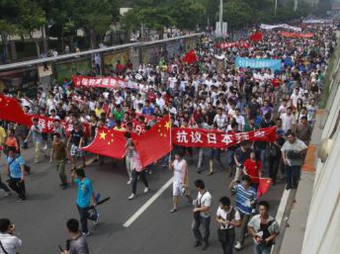 Trung Quốc đề nghị Mỹ “chấm dứt trò chơi nguy hiểm” - ảnh 1