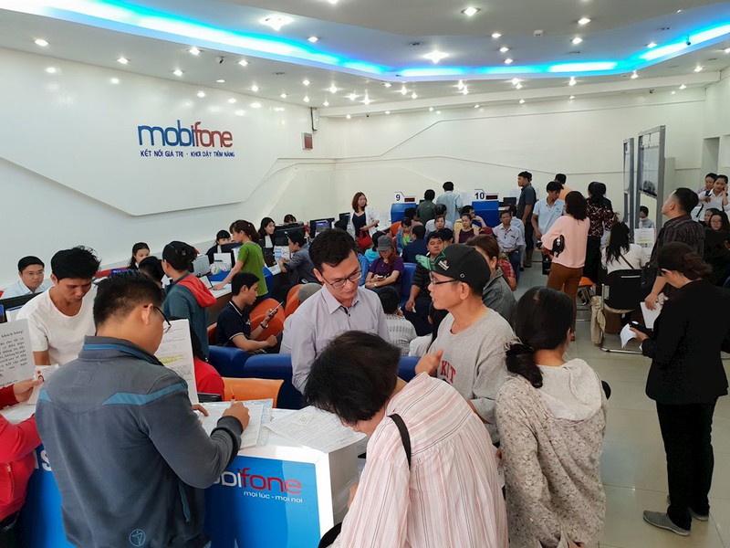 Người dân TP.HCM chen lấn đi đăng ký thông tin trước giờ G - ảnh 5