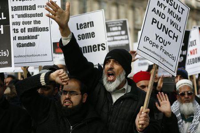 Anh: Người Hồi giáo biểu tình phản đối tòa soạn Charlie Hebdo - ảnh 5