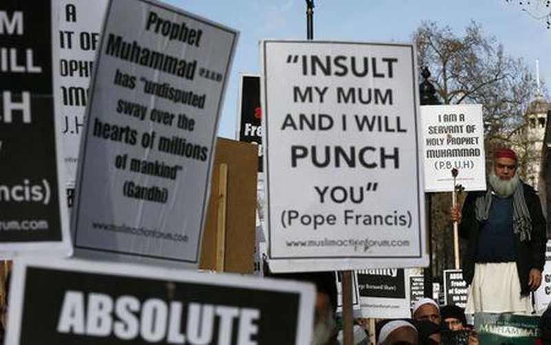 Anh: Người Hồi giáo biểu tình phản đối tòa soạn Charlie Hebdo - ảnh 6