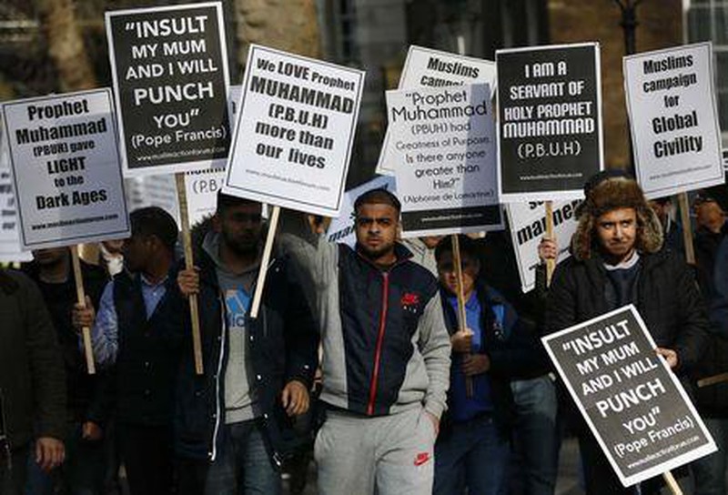 Anh: Người Hồi giáo biểu tình phản đối tòa soạn Charlie Hebdo - ảnh 7