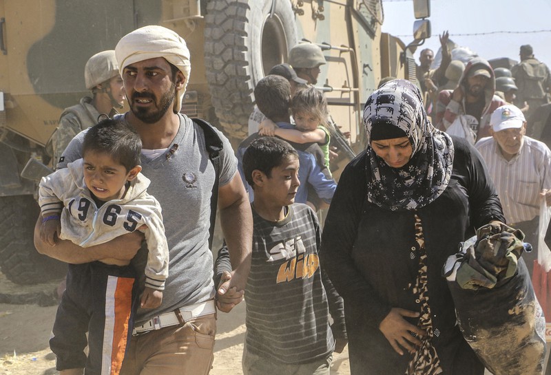 Ảnh: Xót xa người tị nạn Syria gần biên giới Thổ Nhĩ Kỳ - ảnh 8