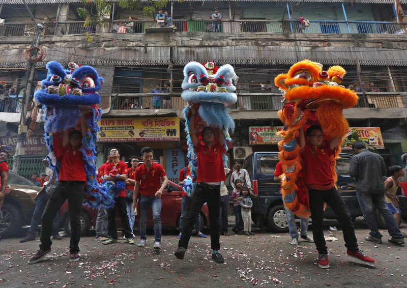 Người dân châu Á làm gì trong dịp Tết Bính Thân 2016? - ảnh 1