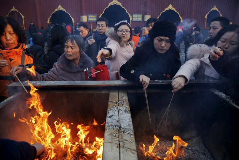 Người dân châu Á làm gì trong dịp Tết Bính Thân 2016? - ảnh 14