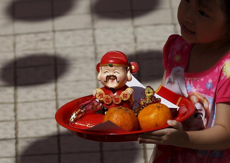 Người dân châu Á làm gì trong dịp Tết Bính Thân 2016? - ảnh 20