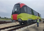 Close-up of first train of Hanoi’s second metro line put on rails