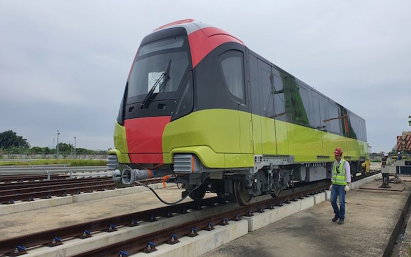 Close-up of first train of Hanoi’s second metro line put on rails