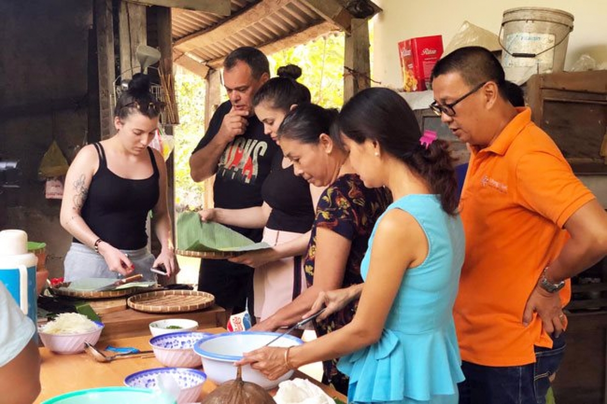 Visitors at a homestay facility in Ben Tre Province. (Photo: Hoang Anh)