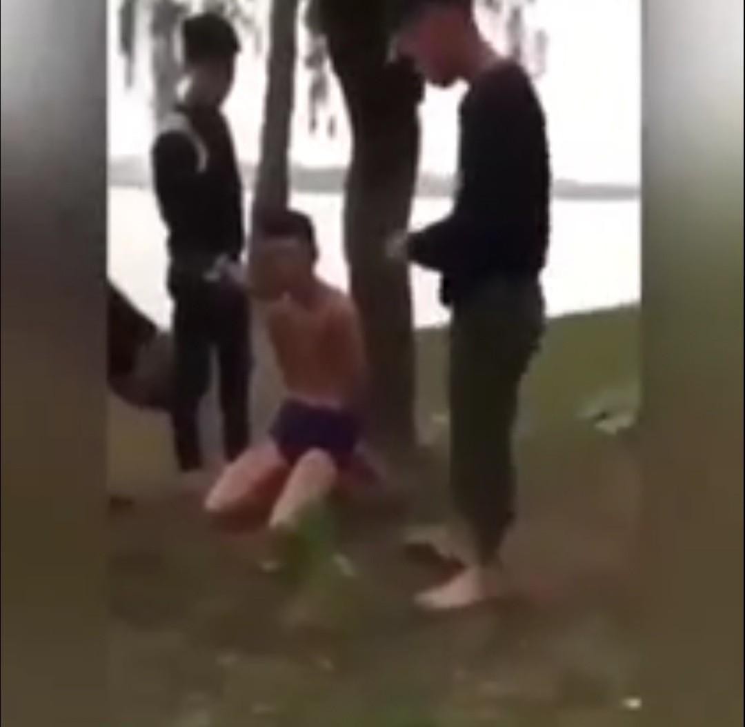 Tạm giữ hình sự 13 đối tượng tra tấn, 'chôn sống' thanh niên 17 tuổi ảnh 1