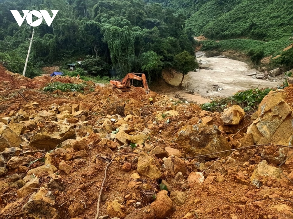 Excavators are utilised to remove soil as the search for missing victims at Rao Trang 3 Hydropower Plant gets underway