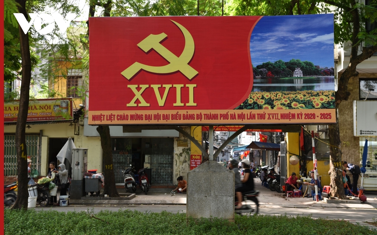 Plenty of major streets throughout Hanoi, including Le Hong Phong street, can be seen bearing incredible decorations, including national flags, colourful flowers, lights, and numerous banners in order to mark the capital's 17th Party Congress for the 2020-2025 term.