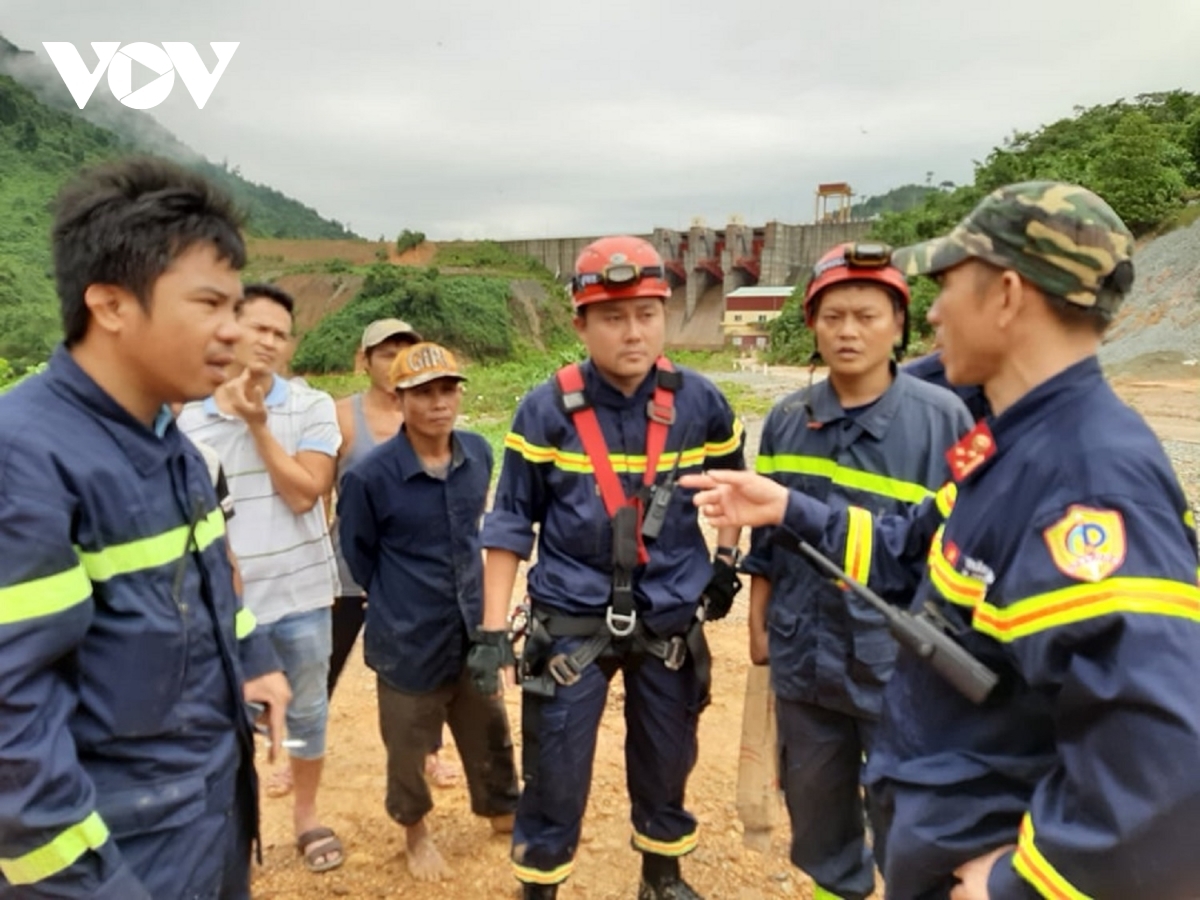 Rescue teams discuss their plans to search for the missing