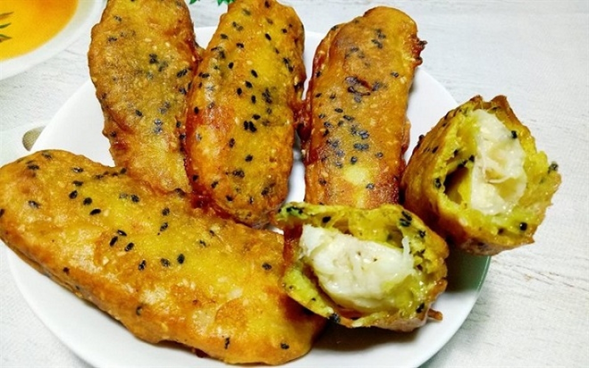 Banh chuoi, banana cake, is one of the nation’s finest desserts. The cake does not taste overly sweet and is covered with black sesame.