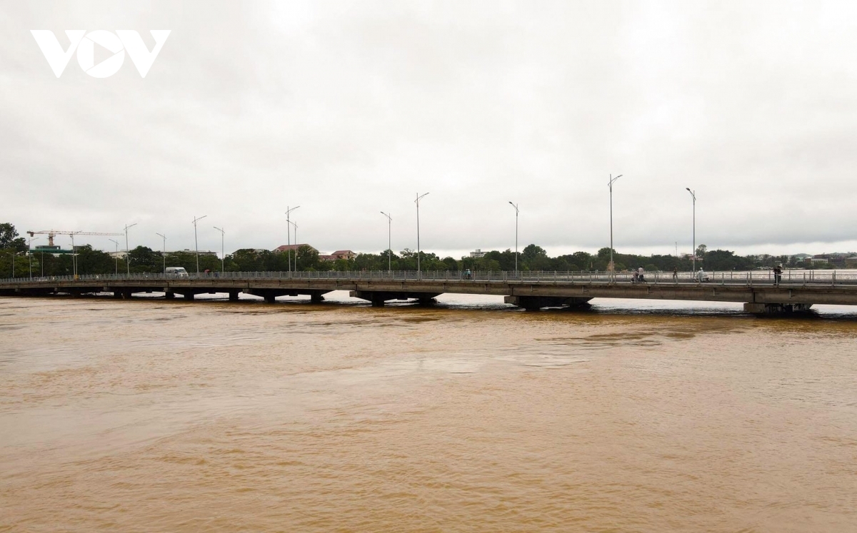 The scene as Phu Xuan bridge sits just above the water level