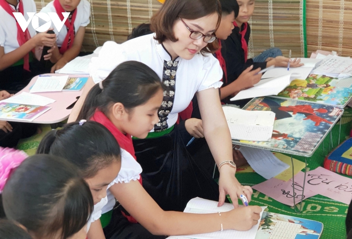 Dang Thi Hong Anh, principal of the Hoang Van Thu primary and secondary school in Nghia Lo town, says most of the students are eager to study in order to discover their culture and learn to preserve it.