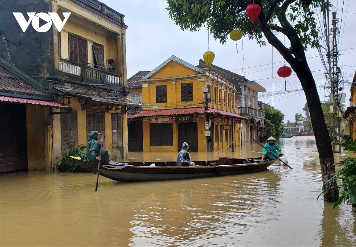 Residents utilise boats as they travel in Hoi An city. The use of such vessels is done in order to get on with normal life amid rising floodwater.
