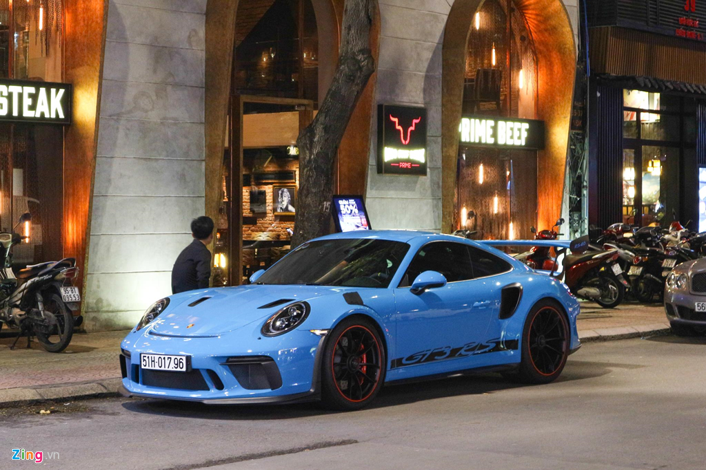 Sieu xe Porsche 911 GT3 RS mau xanh la doc nhat xuong pho Sai Gon hinh anh 7 