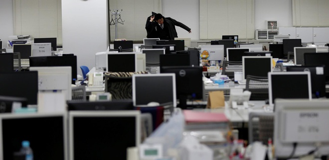 Nhat Ban 'ep' nhan vien ve som, khong cho lam them gio hinh anh 1