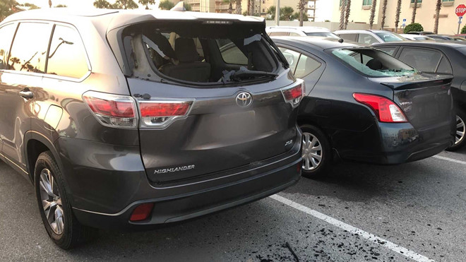 Nguoi dan ong bi bat vi dap pha cua kinh 20 oto hinh anh 5