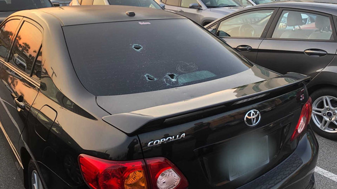 Nguoi dan ong bi bat vi dap pha cua kinh 20 oto hinh anh 7