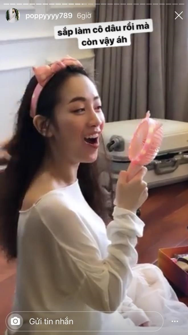 Con gai Minh Nhua mac vay co dau, tinh tu ben 'chong sap cuoi' hinh anh 3