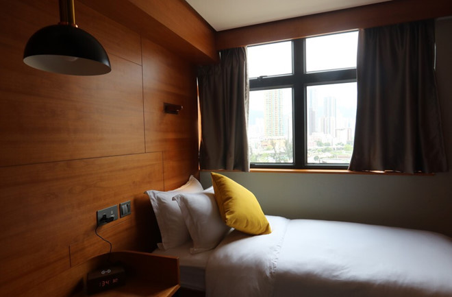 Gia nha qua dat, nguoi tre Hong Kong thue nha chung, chia cho o hinh anh 3