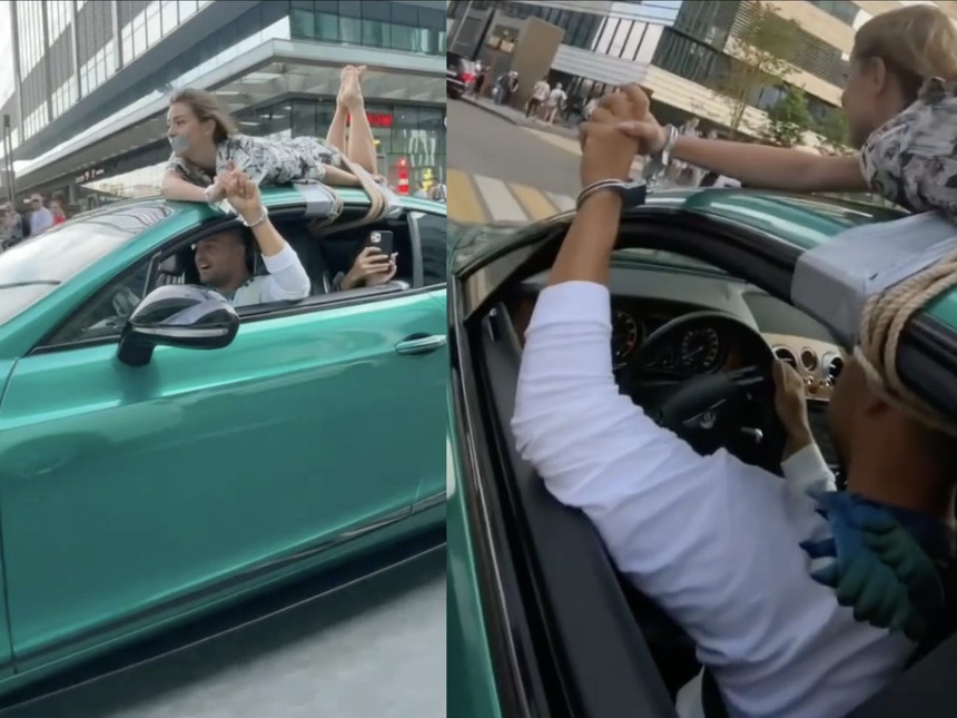 troi ban gai tren noc oto anh 1